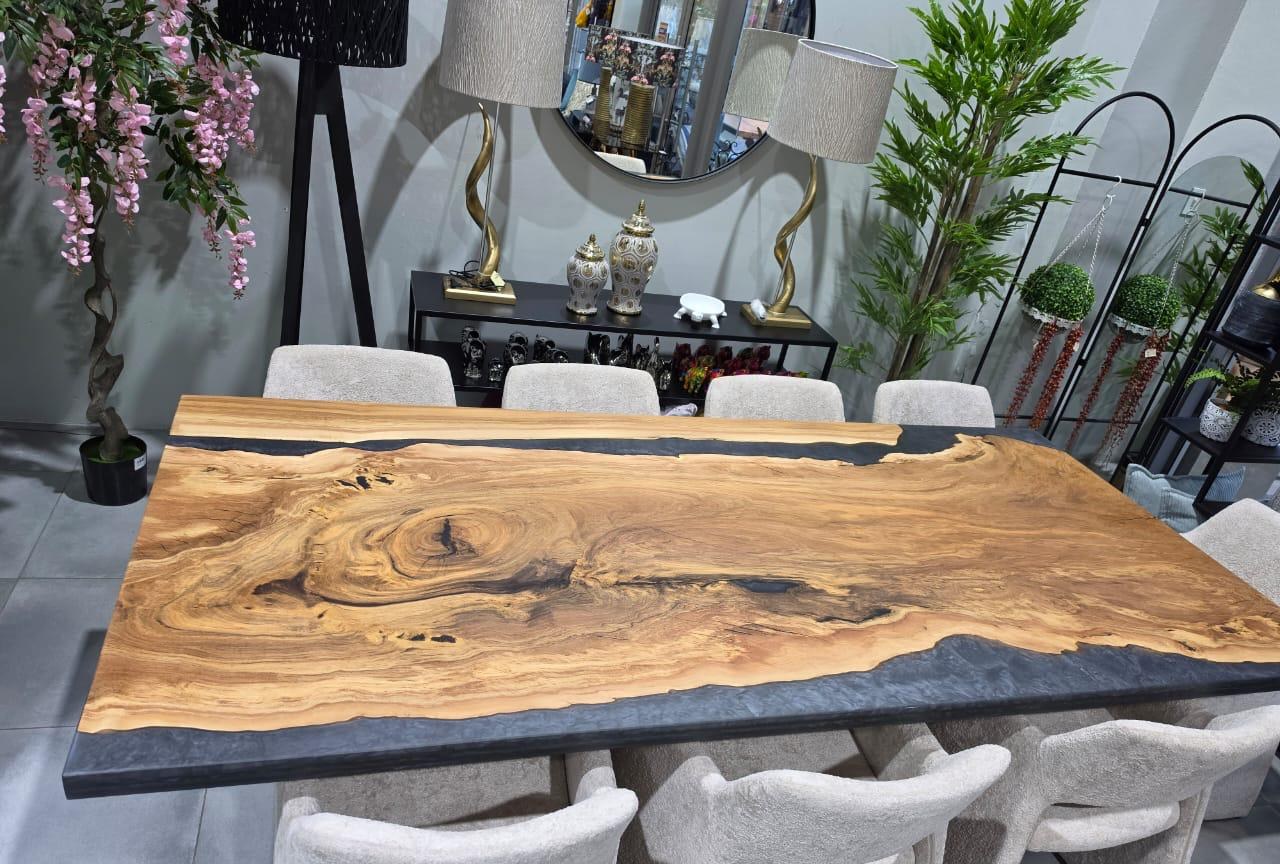 Obsidian — Live edge and a graphite-black river, made for a ten-seat room.