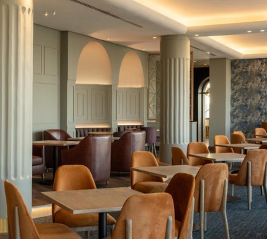 Breakfast area tables and leather dining chairs