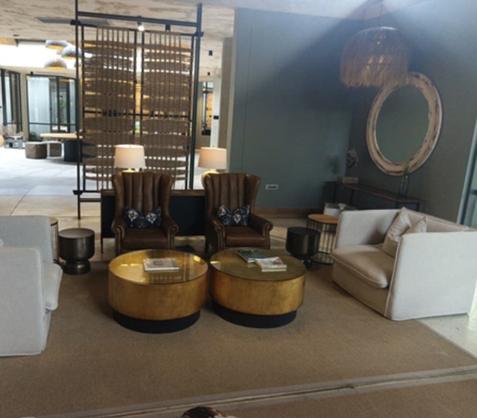 Screen joinery and lounge chairs in the lobby