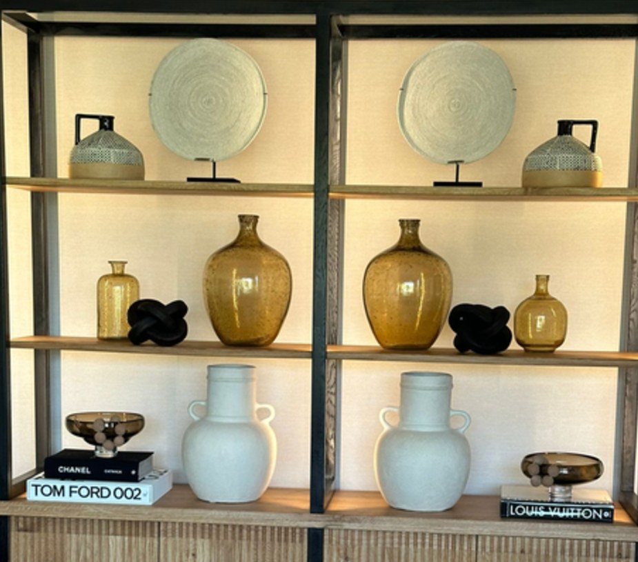 Display cabinetry with lit shelving