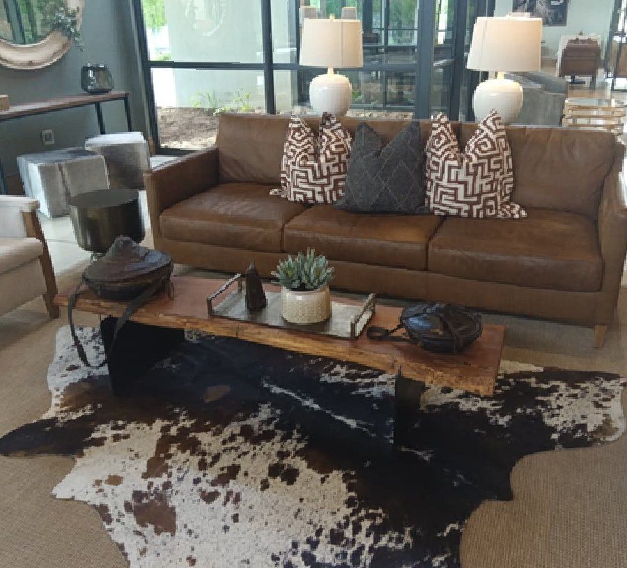 Leather lounge seating with a solid slab coffee table