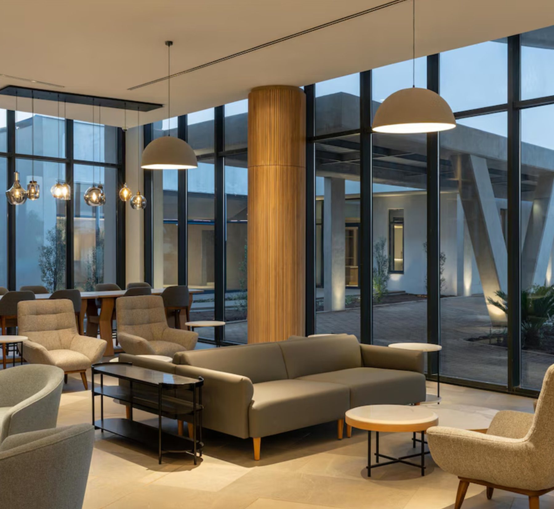 Radisson Hotel — Guest rooms, suites and public areas fitted out as a repeatable package — headboards, desks, casegoods, loose furniture and lounge seating.